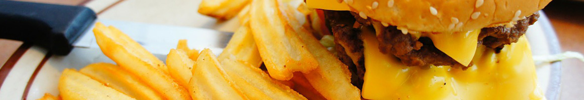 Eating Burger at Charcoaler Drive-In restaurant in El Paso, TX.